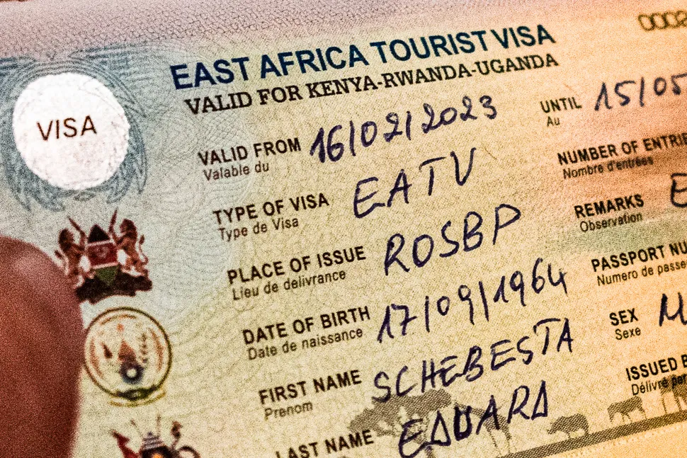 Passport with the East Africa Tourist Visa An Image of a tourist passport stamped with the East Africa Tourist Visa